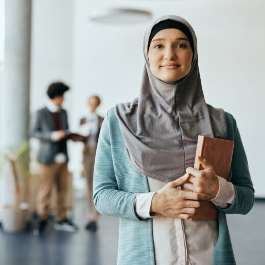 middle-eastern-businesswoman-standing-in-hallway-o-2026-01-06-10-41-36-utc